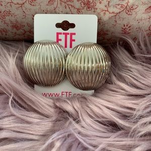 Women silver round earrings.